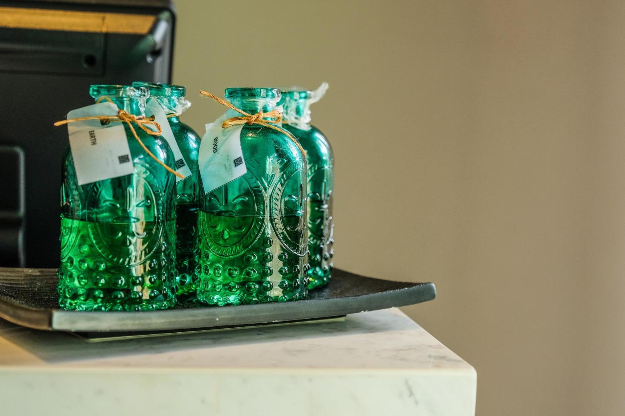 Fusion Suites Phuket Patong Esterno foto Bottles of absinthe