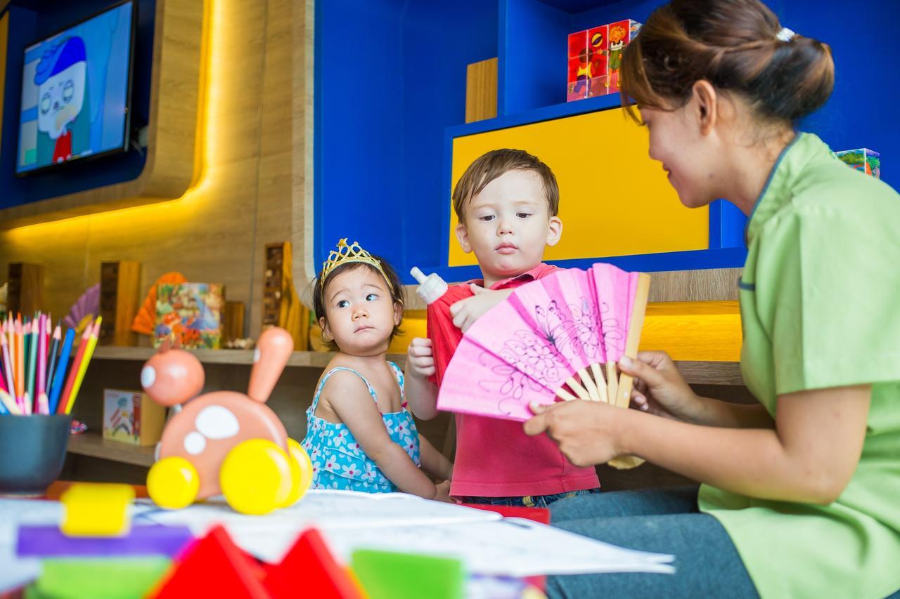 Fusion Suites Phuket Patong Esterno foto Childcare at the airport