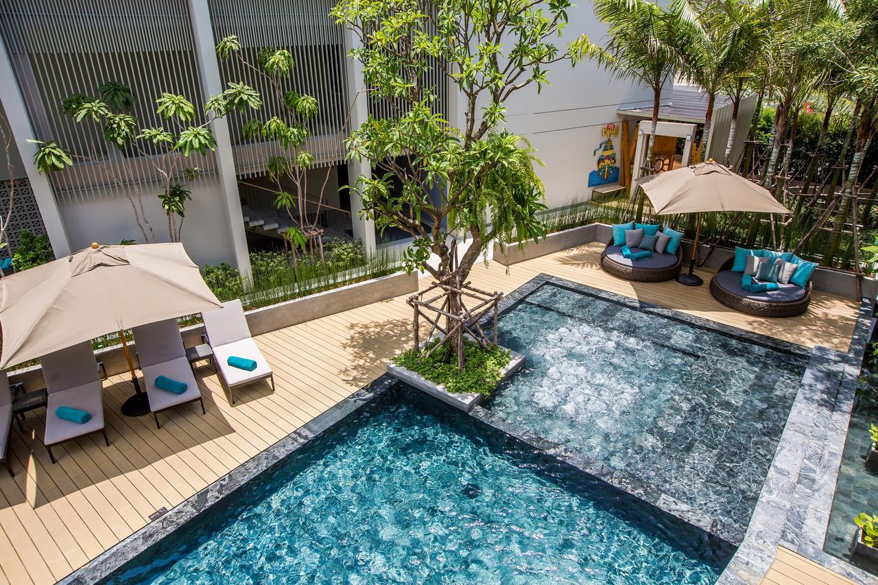 Fusion Suites Phuket Patong Esterno foto The swimming pool at the hotel