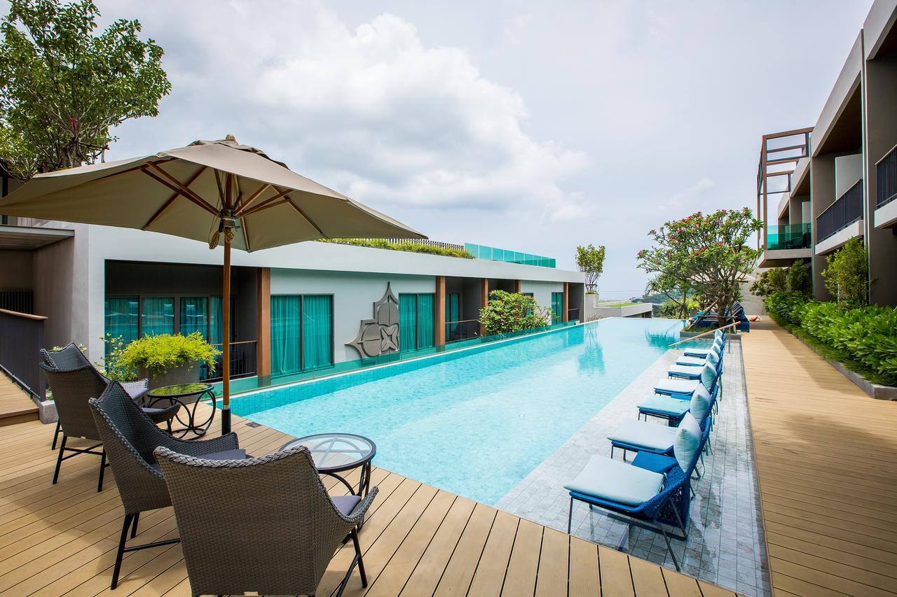 Fusion Suites Phuket Patong Esterno foto The swimming pool at the hotel