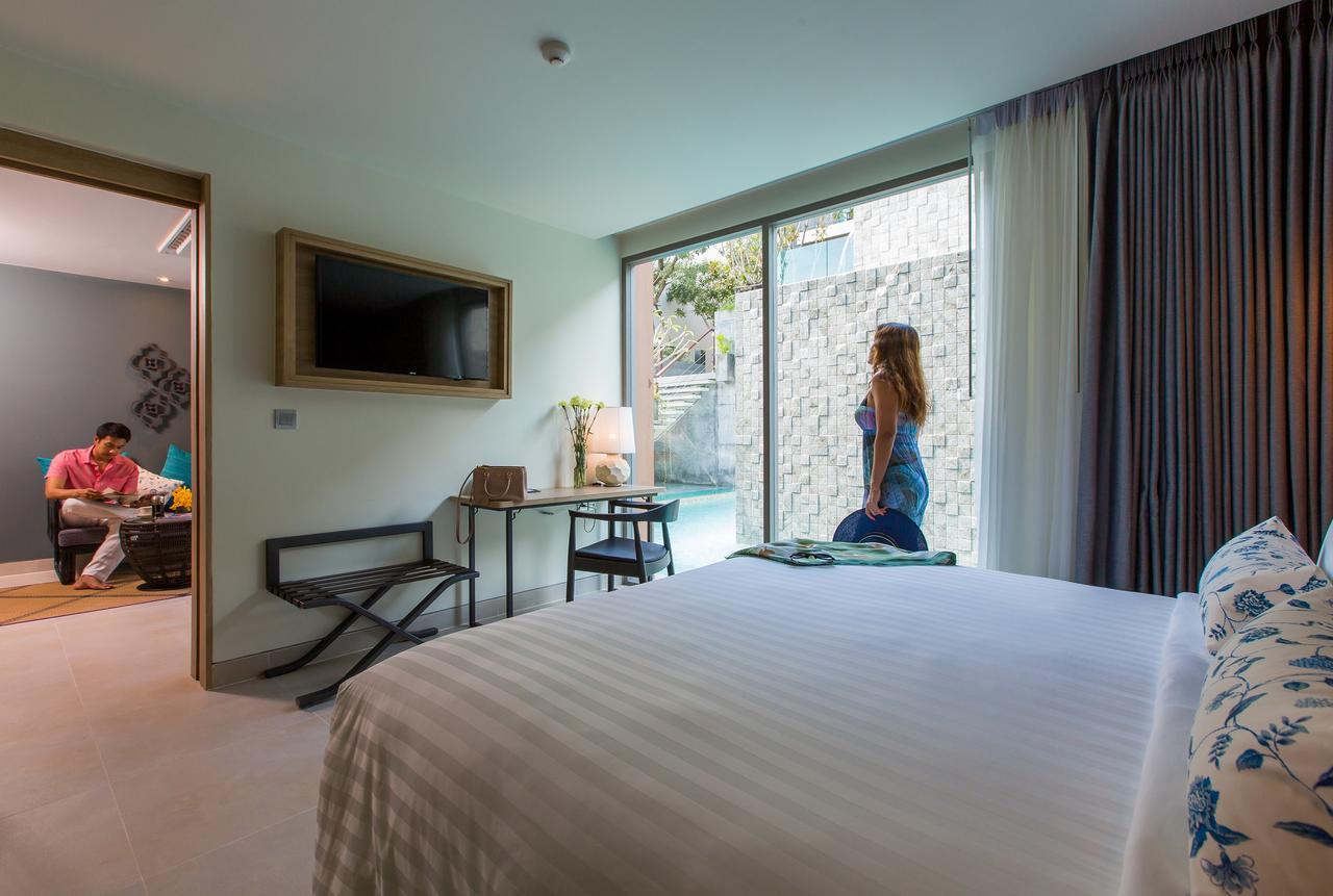 Fusion Suites Phuket Patong Esterno foto A room at the hotel