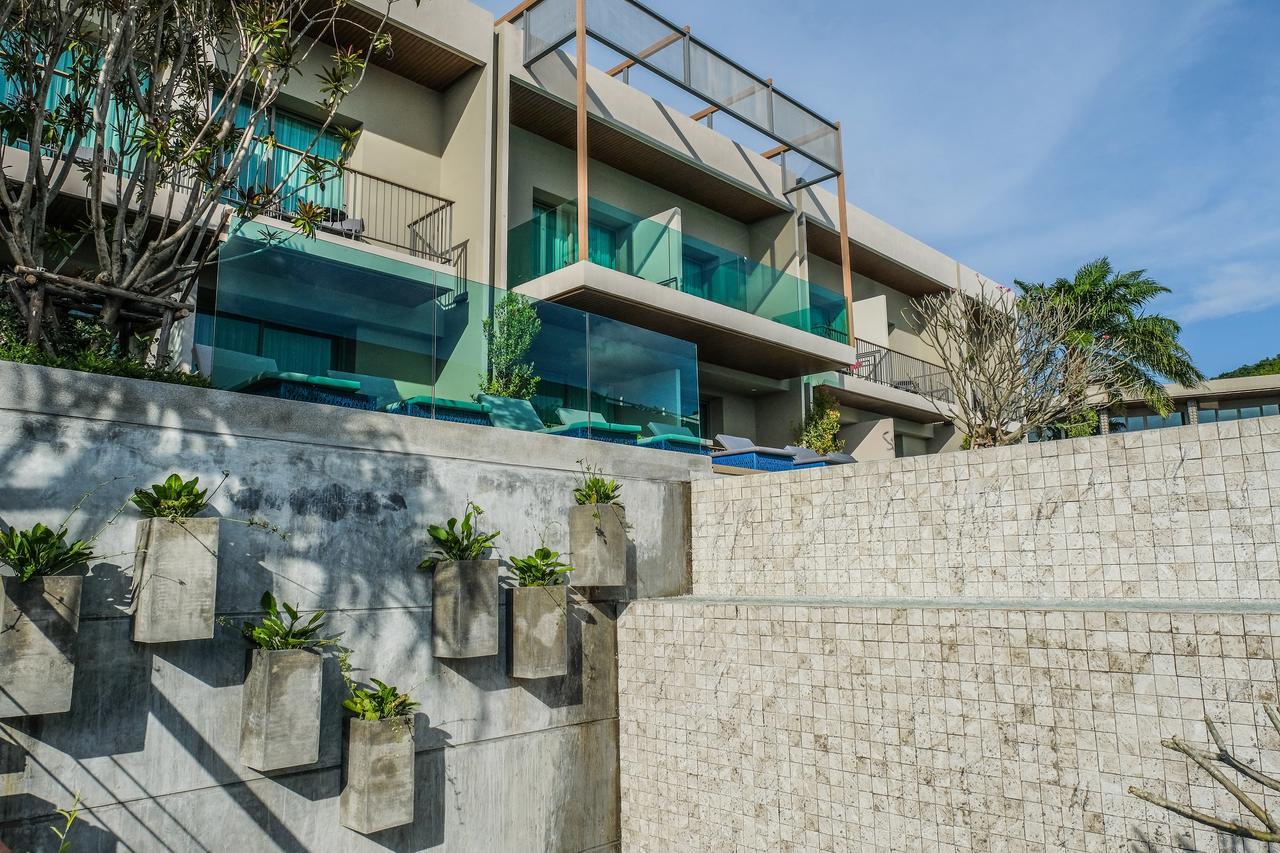 Fusion Suites Phuket Patong Esterno foto The hotel's pool